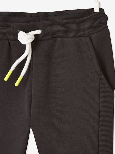 Pantalón deportivo de felpa con bandas de canalé, para niño NEGRO OSCURO LISO CON MOTIVOS 