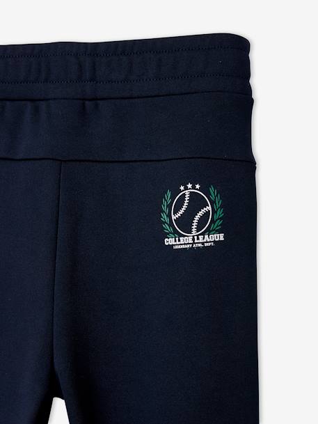 Pantalón de deporte para niño, tejido técnico AZUL OSCURO LISO CON MOTIVOS 